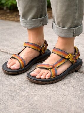 Teva strappy sandals in yellow, orange, blue and brown